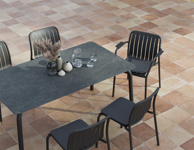 Roku Ceramic Dining Table - residential setting